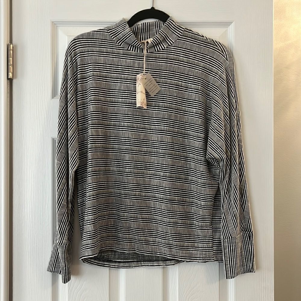 Brand new with tags size small hem and thread